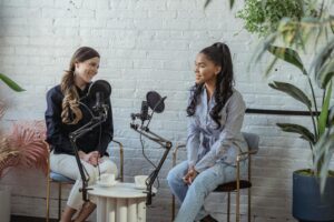 two women recording a podcast